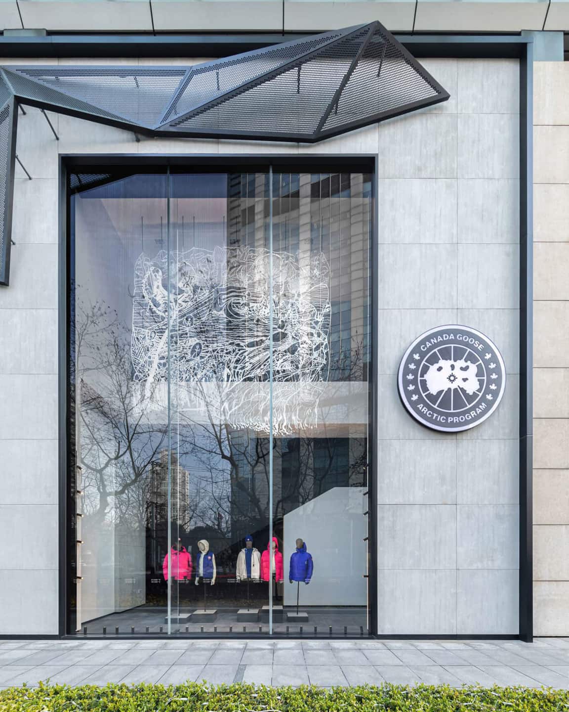 Alex Fischer & Qavavau Manumie, ᐃᒻᒪᕕᒻᒥ Upon the Sea 海上, 2021, ≅15'×15' water cut aluminium, white paint. on display at iAPM, Shanghai, China